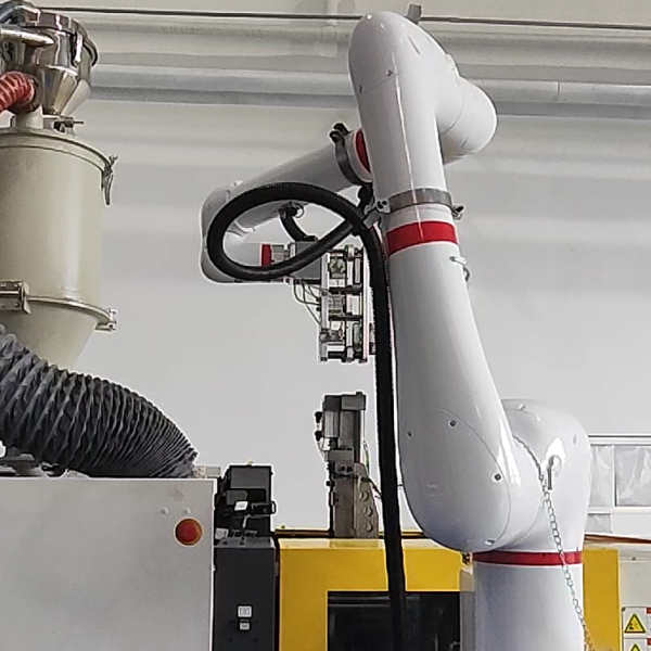 XV Technology CR610 collaborative robot for loading and unloading of injection molding assembly